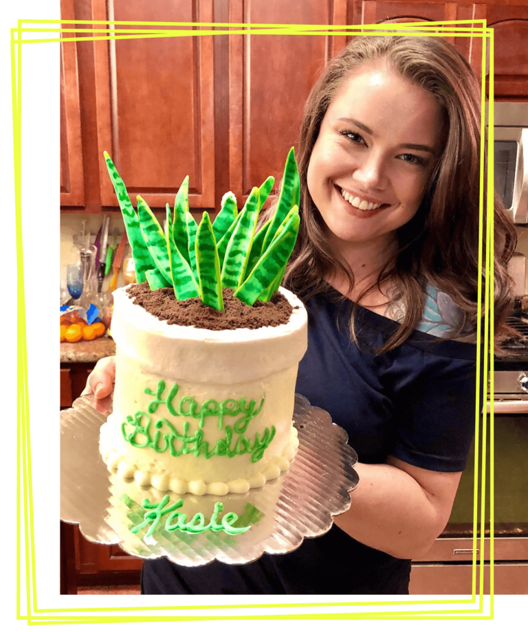 Kasie holding a birthday cake